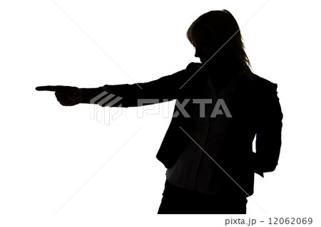 Woman showing by forefinger at something Woman showing by forefinger at something 12062069