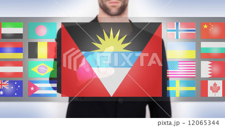 Hand pushing on a touch screen interface 12065344