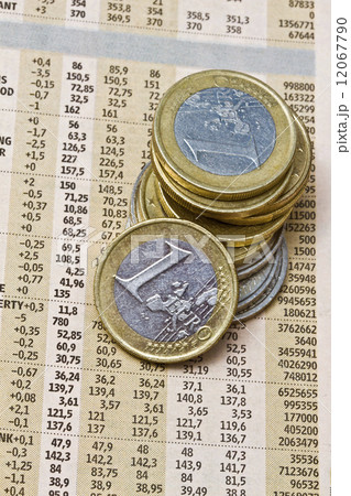 Euro coins on a financial newspaper Euro coins on a financial newspaper 12067790