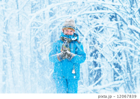 Funny boy caught in a snow storm 12067839