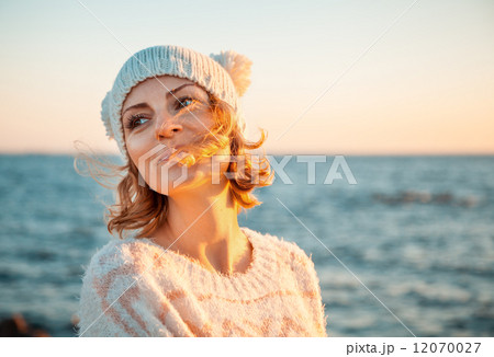 Woman in knitted clothes Woman in knitted clothes 12070027