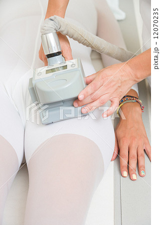 Therapist applying lipo massage  LPG therapy 12070235