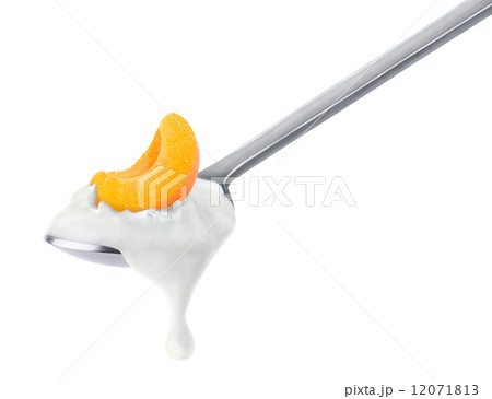 Spoon of peach yogurt Spoon of peach yogurt 12071813