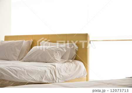 modern white bed and pillow in the morning mood  12073713