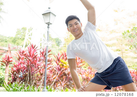 stretching in the park 2 12078168