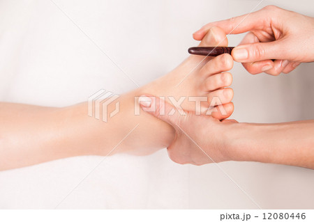 masseur makes thai foot massage masseur makes thai foot massage 12080446