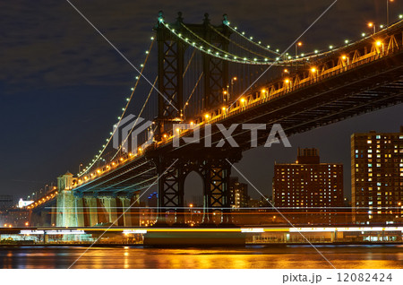 Manhattan Bridge and skyline view from Brooklyn at night Manhattan Bridge and skyline view from Brooklyn at night 12082424