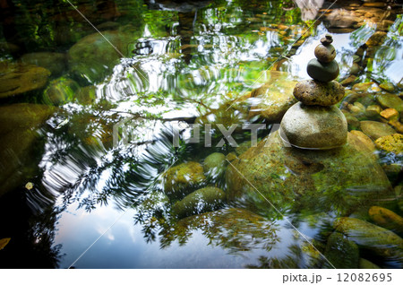 Tropical rain forest landscape with balancing rocks tower 12082695