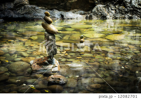 Tropical rain forest landscape with balancing rocks tower 12082701