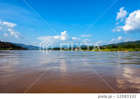 Panoramic view of Mekong river flowing between Laos and Thailand Panoramic view of Mekong river flowing between Laos and Thailand 12083332