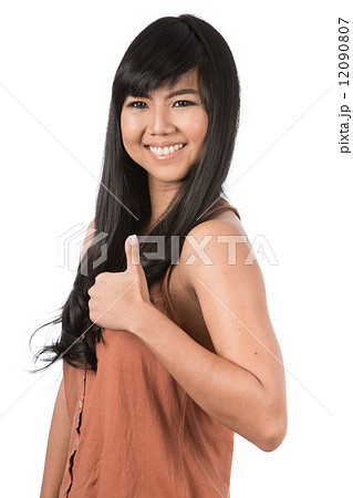 Asian girl giving thumbs up 12090807