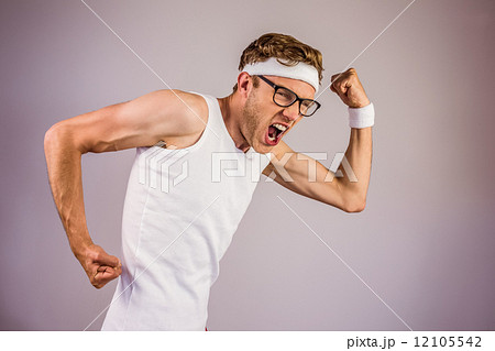 Geeky hipster posing in sportswear 12105542