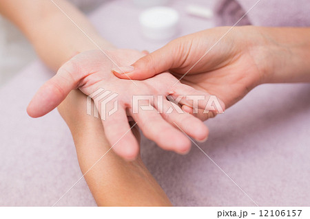 Woman getting a hand massage 12106157