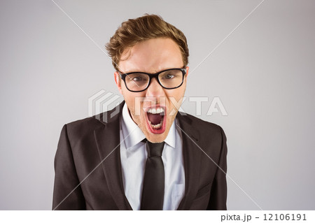 Young angry businessman shouting at camera 12106191