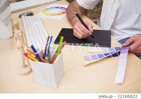 Artist drawing something on graphic tablet Artist drawing something on graphic tablet 12106822