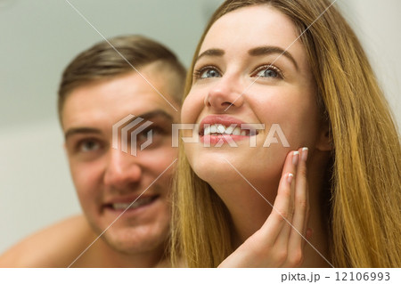 Cute couple smiling brightly together 12106993