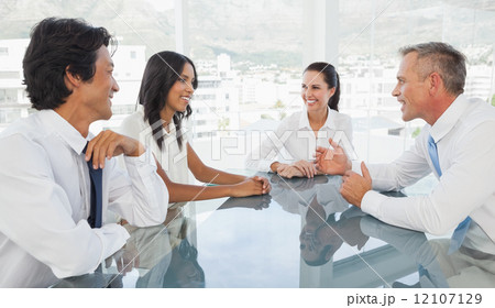 Happy business team talking together 12107129