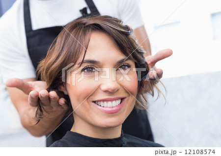 Pretty brunette at her hair appointment Pretty brunette at her hair appointment 12108574