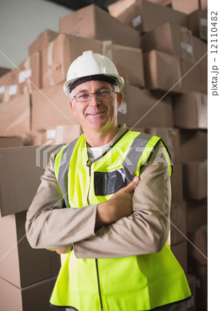 Manual worker in warehouse 12110482