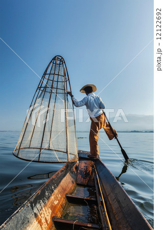 Traditional Burmese fisherman at lake, Myanmar Traditional Burmese fisherman at lake, Myanmar 12122692