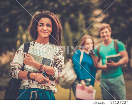 African-american girl student in a city park on summer day 12127224