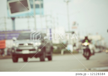 blurred of car on road blurred of car on road 12128384
