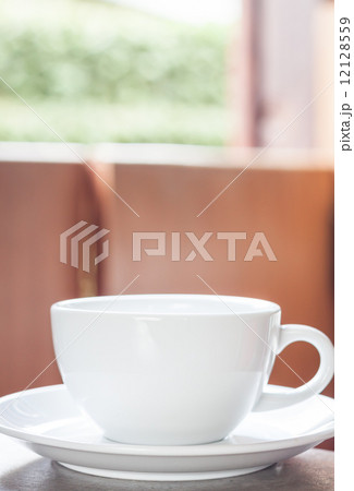 White coffee cup on the table White coffee cup on the table 12128559