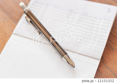 Bank account passbook with pen 12131322