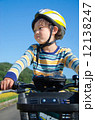 boy riding a bike 12138247