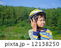 boy riding a bike 12138250