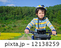 boy riding a bike 12138259