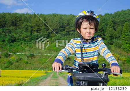 boy riding a bike 12138259