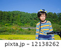 boy riding a bike 12138262