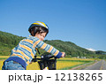 boy riding a bike 12138265
