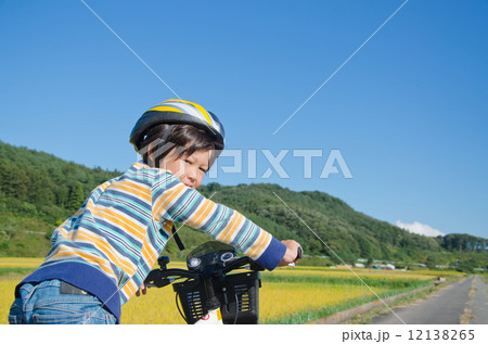boy riding a bike 12138265