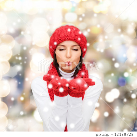 smiling young woman in winter clothes 12139728