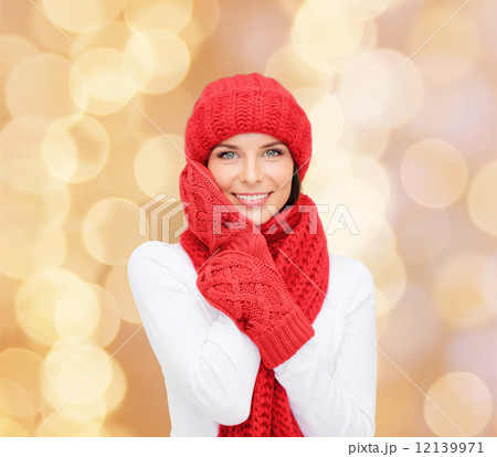 smiling young woman in winter clothes smiling young woman in winter clothes 12139971