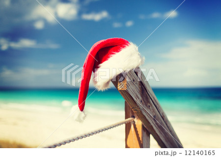 close up of santa helper hat on beach close up of santa helper hat on beach 12140165