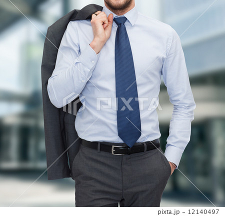 close up of businessman standing outdoors 12140497