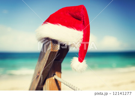 close up of santa helper hat on beach close up of santa helper hat on beach 12141277