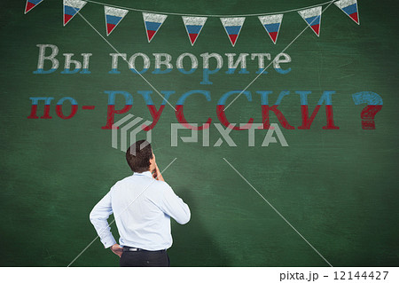 Composite image of thinking businessman touching his chin Composite image of thinking businessman touching his chin 12144427