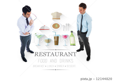 Unsmiling businessman holding glasses 12144820