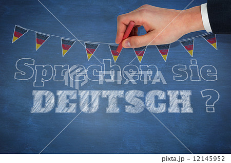 Composite image of hand writing with a chalk 12145952