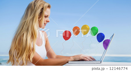 Composite image of pretty blonde using her laptop at the beach Composite image of pretty blonde using her laptop at the beach 12146774