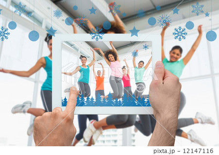 Composite image of hands holding tablet pc 12147116