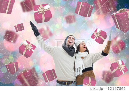 Composite image of young winter couple 12147862