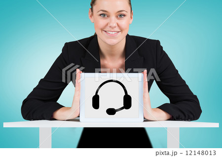 Composite image of businesswoman showing tablet pc Composite image of businesswoman showing tablet pc 12148013