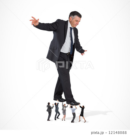 Composite image of business team supporting boss Composite image of business team supporting boss 12148088