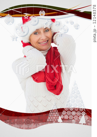 Composite image of festive woman smiling at camera Composite image of festive woman smiling at camera 12148378