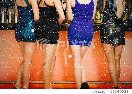 Composite image of sexy women legs standing at bar 12149583
